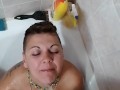 Pissing on girlfriend while she was sitting a bathtub