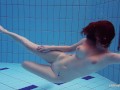 Big tits Katrin bouncing and floating underwater