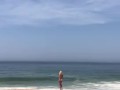 Naked tits near the ocean
