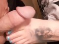 Rubbing my cock with her foot. Trying to fuck her toes