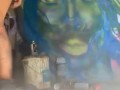 Girl with nice ass in booty shorts does graffiti