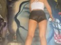 Girl with nice ass in booty shorts does graffiti