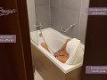 Spied on hot neighbor while she masturbated in the shower and then joined her
