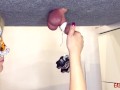 Mistress plays with the slave's dick and hangs weights on him EasyCBTGirl