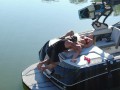 MILF getting her pussy licked on a boat in the middle of the lake