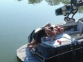 MILF getting her pussy licked on a boat in the middle of the lake