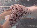 Blonde babe Okuneva shaved pussy underwater swimming