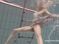 Blonde babe Okuneva shaved pussy underwater swimming