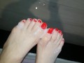 Red nail soles covered with lots of sperm