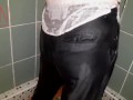 A chick in clothes under the shower. Wet panties, wet trousers, wet shirt. 2