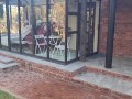 Bikini slut pissing from a balcony