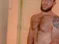VERY HAIRY GUY STROKES HIS THICK COCK AND CUMS WHILE THINKING OF YOU