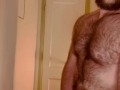 VERY HAIRY GUY STROKES HIS THICK COCK AND CUMS WHILE THINKING OF YOU