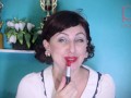 Red lipstick kissing teasing by Regina Noir.