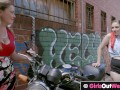 Hot busty blonde lesbian gets licked next to her motorbike