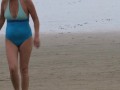 Latina mom shows off, masturbates and fucks on the beach