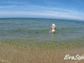 Naked mommy bathing naked in the sea