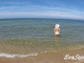 Naked mommy bathing naked in the sea