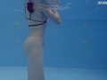 Marfa is cute shy Russian pornstar who gets naked in the pool