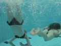 Nastya undresses Libuse in the pool like a lesbian