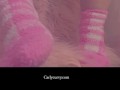 Cute socks and pussy play in a soft pink setting! 