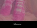 Cute socks and pussy play in a soft pink setting! 