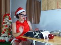 Pretty lady secretary dressed as a gnome, Santa's assistant on Christmas eve. FULL