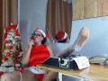 Pretty lady secretary dressed as a gnome, Santa's assistant on Christmas eve. 1