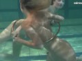 Russian lesbian girls swimming in the pool