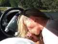 Milf sucking dick on the parking by the public road. Public cock sucking and cumshot