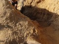 Hot brunette risks masturbating on a public beach while doing her exercise