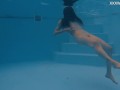 Petite Russian Marfa swims nude in the pool