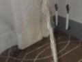Naughty pisser soaks carpet and drapes