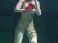 Siskina and Polcharova strip nude underwater
