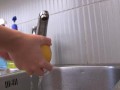 Naughty Teen Masturbates While Squeezing Oranges All Over Her Body