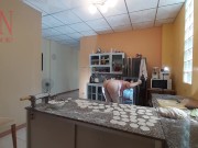 A naked housewife is preparing dinner in the kitchen. The depraved whimsical housekeeper Bra 1