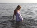 Divine Blonde Teen Blissfully Naked in the Sea