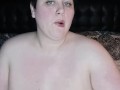 short hair BBW smokes topless
