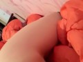 Masturbation squeezing a blanket between legs