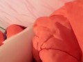 Masturbation squeezing a blanket between legs