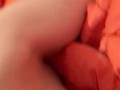 Masturbation squeezing a blanket between legs