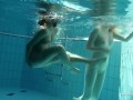 Zuzanna and Lucie kissing underwater