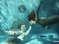 Zuzanna and Lucie kissing underwater