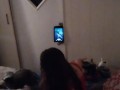 White cute milf in night dress smoking and watching TV