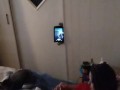White cute milf in night dress smoking and watching TV