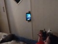 White cute milf in night dress smoking and watching TV