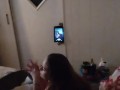 White cute milf in night dress smoking and watching TV