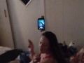 White cute milf in night dress smoking and watching TV