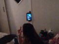 White cute milf in night dress smoking and watching TV
