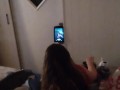 White cute milf in night dress smoking and watching TV